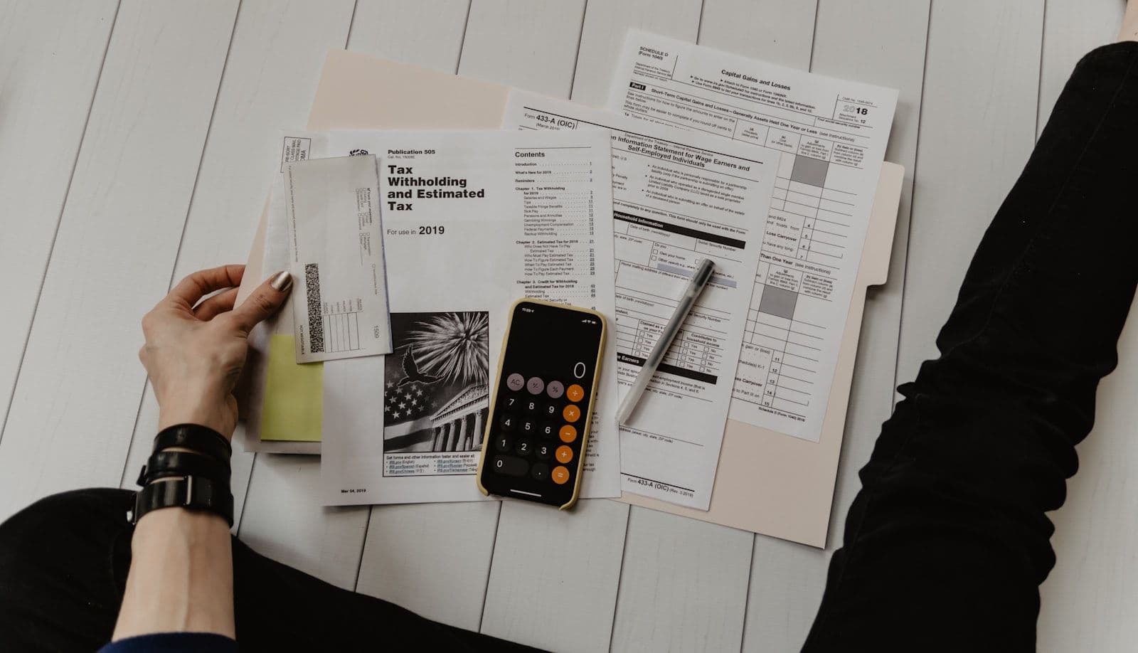 Financial documents and currency on a desk